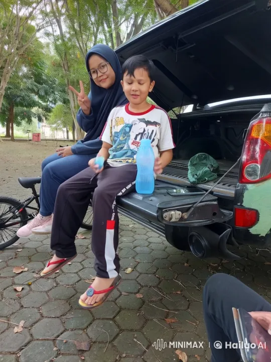 Boy Practices Kung Fu in Park with Companion – AI Generated Video | Hailuo AI