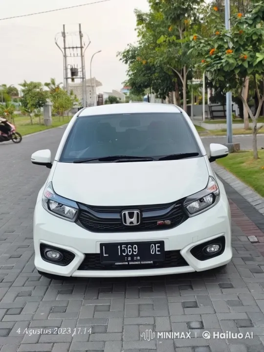 White Honda Car Bounces Gently on Tranquil Street – AI Generated Video | Hailuo AI
