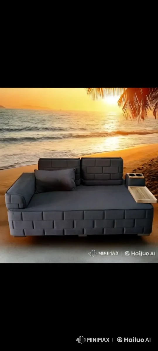 Elegant Woman Relaxing on Beachfront Sofa at Sunset – AI Generated Video | Hailuo AI