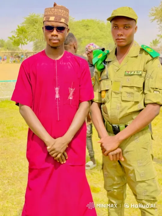 African Man in Red Garb and Military Man Spar in Kung Fu and Boxing – AI Generated Video | Hailuo AI