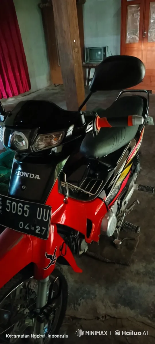 Red Honda Motorcycle Showcased in Rustic Indoor Setting – AI Generated Video | Hailuo AI
