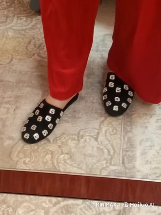 Animated Close-up of Feet in Red Pants and Shimmering Slippers – AI Generated Video | Hailuo AI