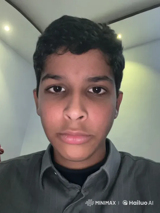 Man Smoking in White Room with Recessed Lighting – AI Generated Video | Hailuo AI