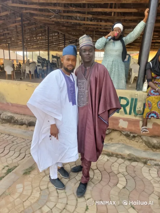 Traditional Nigerian Attire Kung Fu Fight with Cheerful Audience – AI Generated Video | Hailuo AI