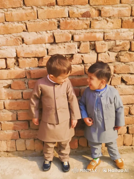 Animated Children Embrace in Traditional Attire – AI Generated Video | Hailuo AI