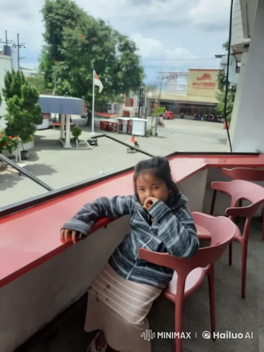 Young Girl Enjoying Burger and Ice Cream on Balcony – AI Generated Video | Hailuo AI