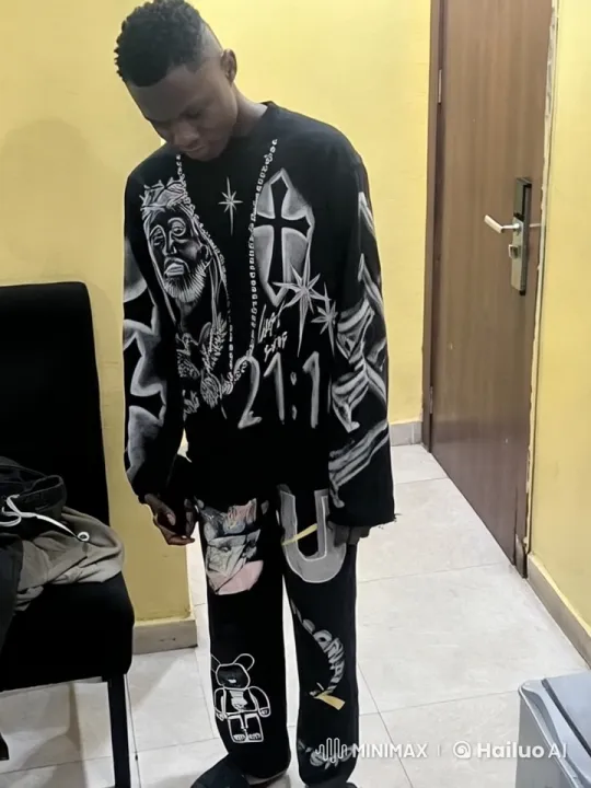 Young Kung Fu Practitioner Demonstrates Skill in Dimly Lit Room – AI Generated Video | Hailuo AI