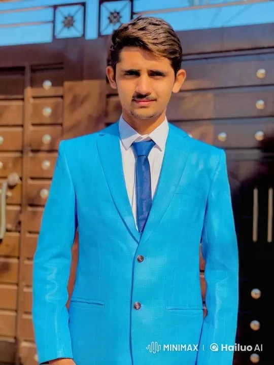 Young Man Poses Confidently in Vibrant Blue Suit – AI Generated Video | Hailuo AI
