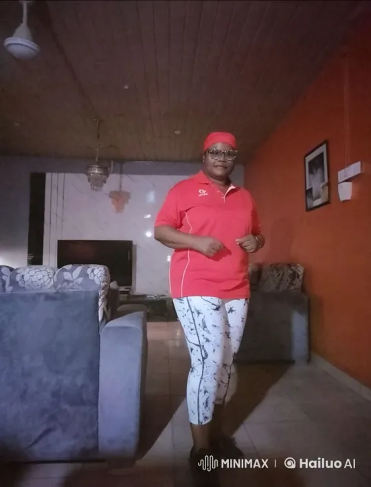 Confident Individual Performs Kung Fu in Cozy Living Room – AI Generated Video | Hailuo AI