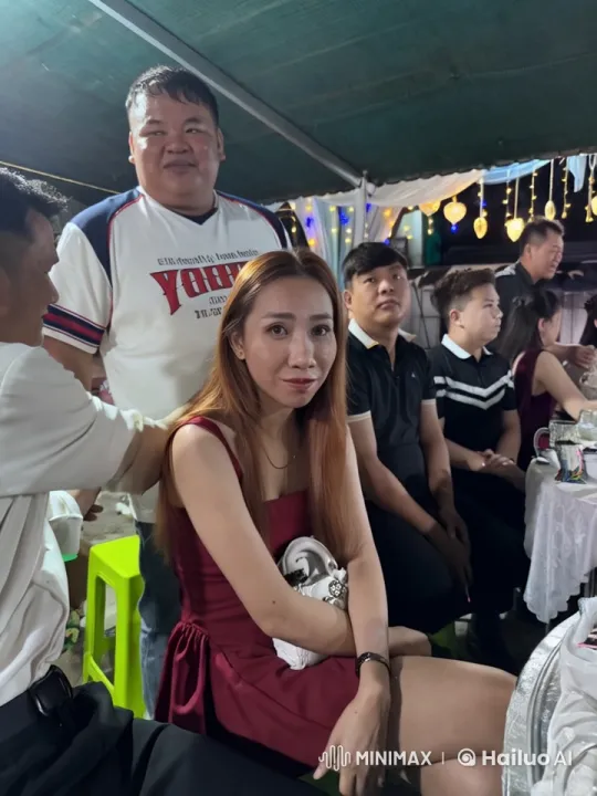 Woman in Red Dress Showcases Martial Arts in Social Setting – AI Generated Video | Hailuo AI
