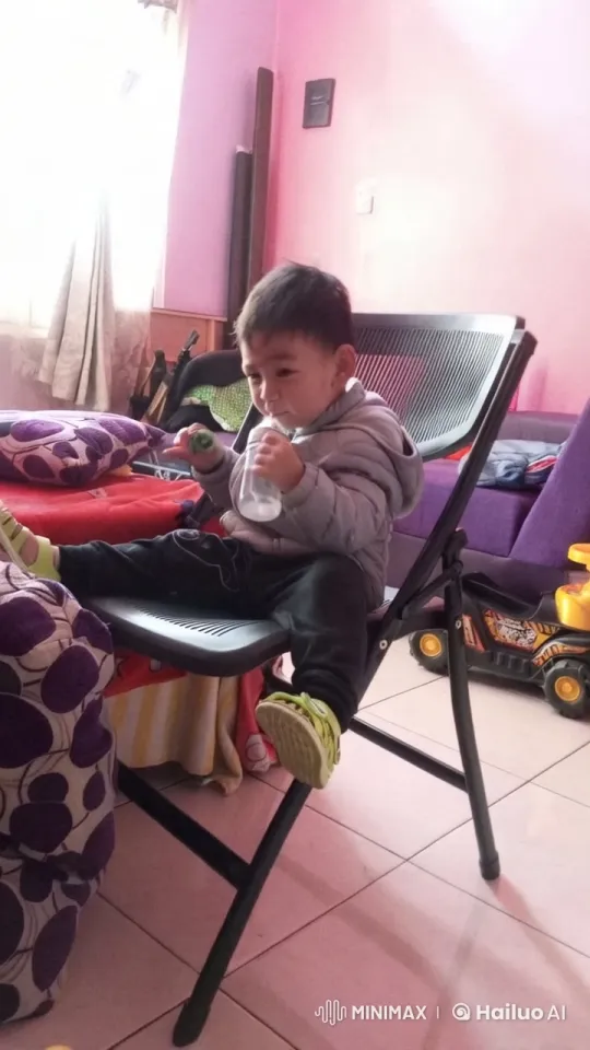 Child Practicing Playful Kungfu in Sunlit Room – AI Generated Video | Hailuo AI