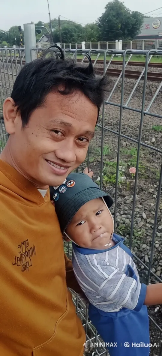 Live2D Animated Scene: Person and Child by Railway Tracks – AI Generated Video | Hailuo AI