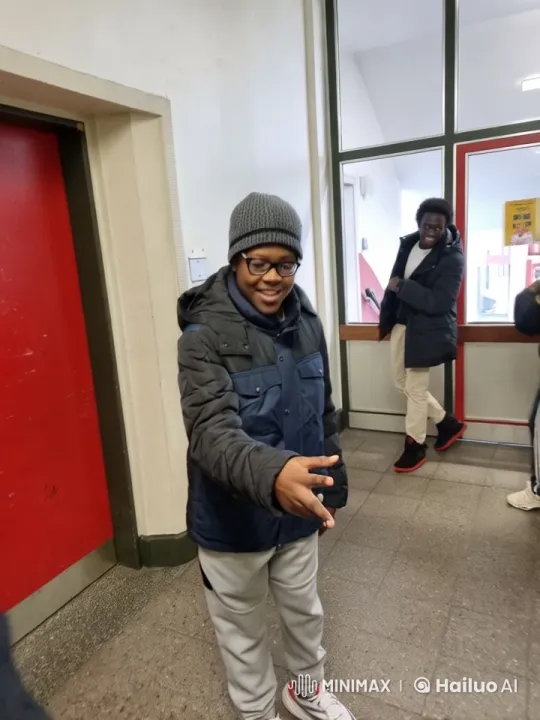 Young Man's Casual Interaction in Hallway Scene – AI Generated Video | Hailuo AI