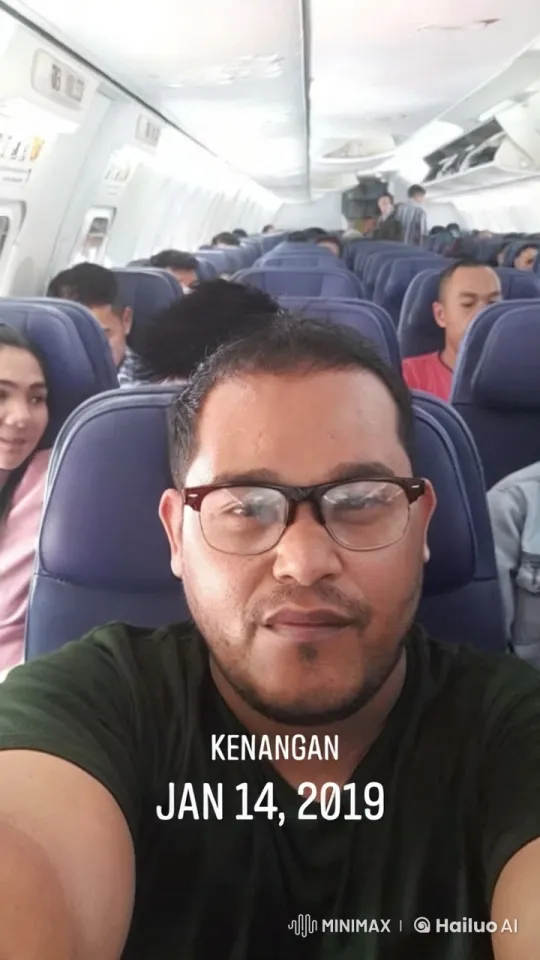 Passenger Practices Kung Fu in Calm Airplane Cabin – AI Generated Video | Hailuo AI
