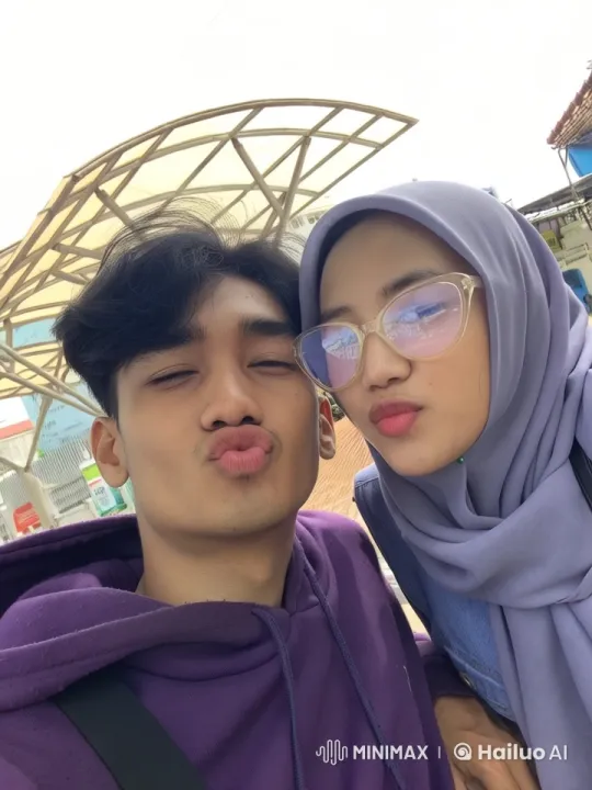 Intimate Moment: Two Individuals Kiss Under Geometric Canopy – AI Generated Video | Hailuo AI