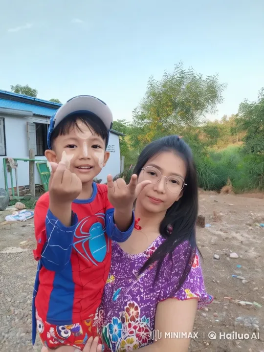 Spider-Man Outfit Boy and Girl Playful Interaction in Rural Setting – AI Generated Video | Hailuo AI