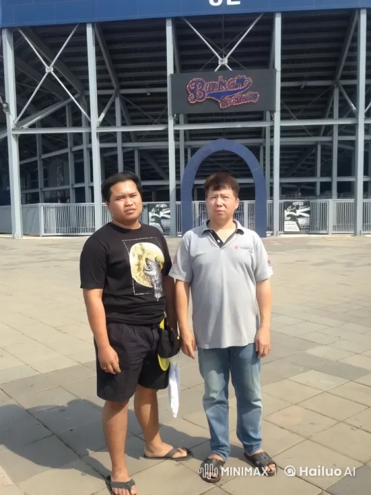 Two Individuals at Busch Stadium Entrance – AI Generated Video | Hailuo AI