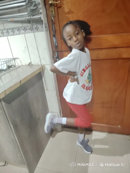 Energetic Child Dancing in Cozy Kitchen Setting – AI Generated Video | Hailuo AI