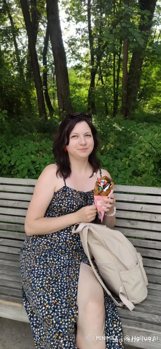 Woman Enjoying Ice Cream in Serene Park – AI Generated Video | Hailuo AI