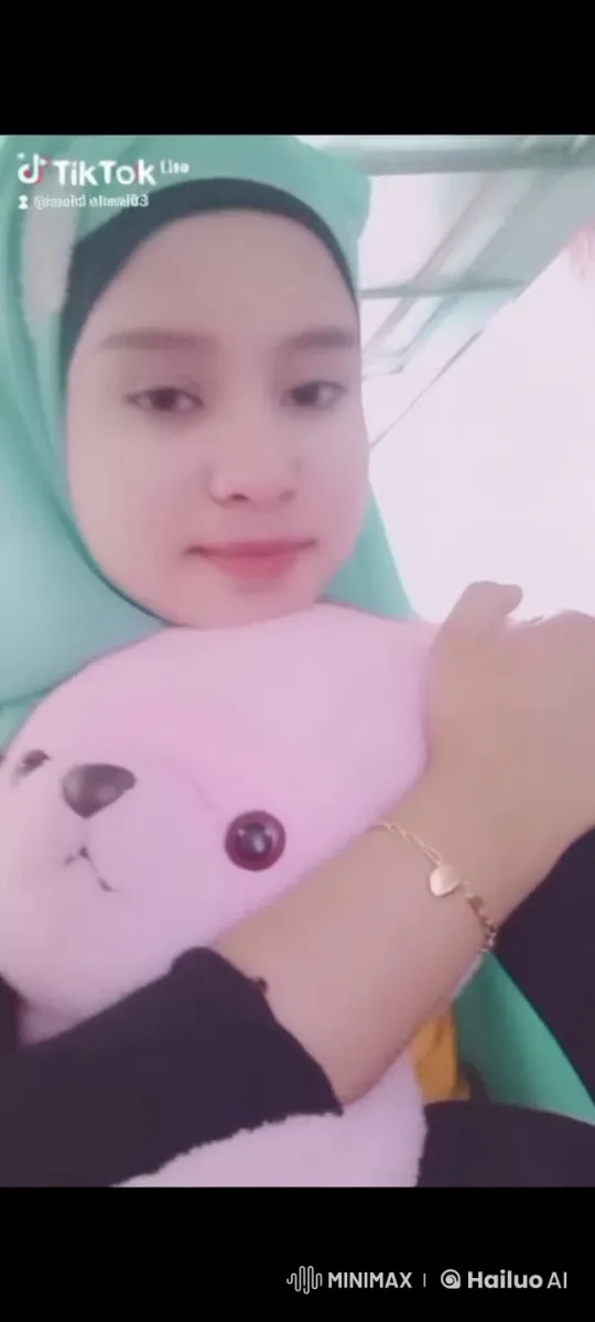 Live2D Video: Tender Care for Pink Stuffed Bear – AI Generated Video | Hailuo AI