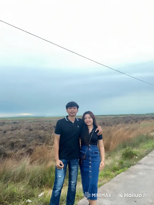 Couple on Path Amidst Dried Grassland at Dusk – AI Generated Video | Hailuo AI