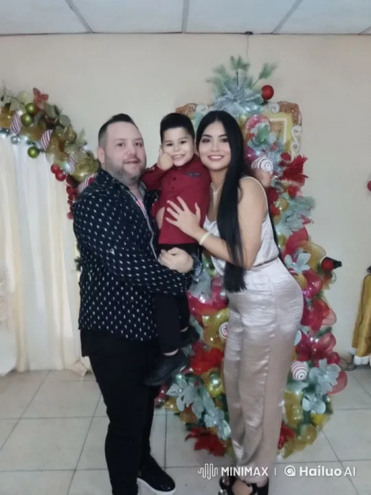 Family Cherishes Holidays in Cozy Christmas Scene – AI Generated Video | Hailuo AI