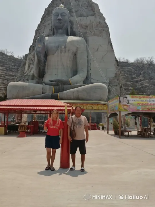 Martial Arts Performance Before a Stone Buddha Statue – AI Generated Video | Hailuo AI