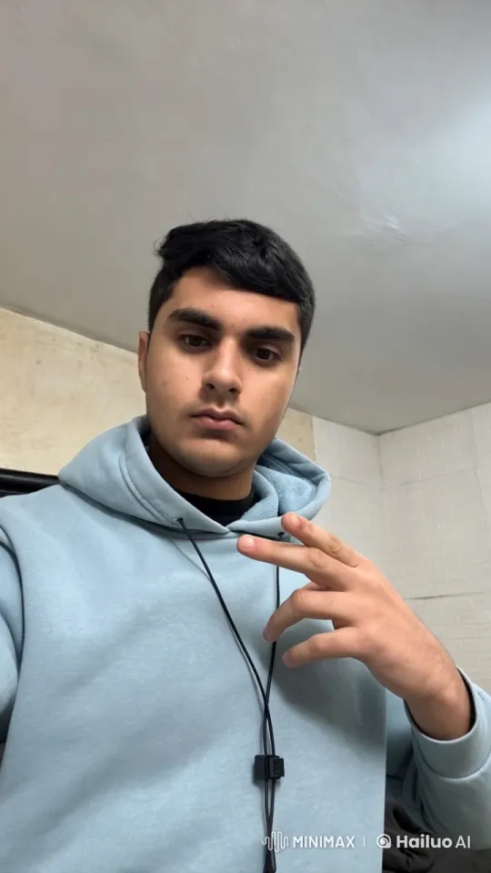 Young Man Smoking in White Room with Live2D Animation – AI Generated Video | Hailuo AI