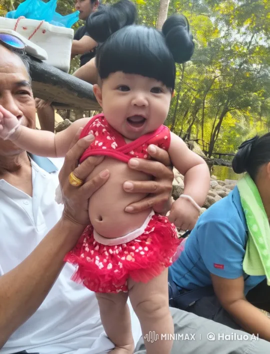 Elderly Man Plays with Animated Baby in Live2D Park Setting – AI Generated Video | Hailuo AI