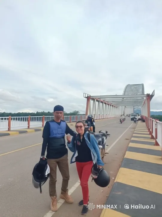 Two Riders Walking on Bridge with Motorcycles – AI Generated Video | Hailuo AI
