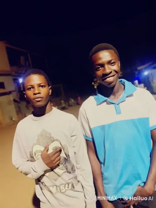 Two Individuals Stand on a Quiet Night Street – AI Generated Video | Hailuo AI