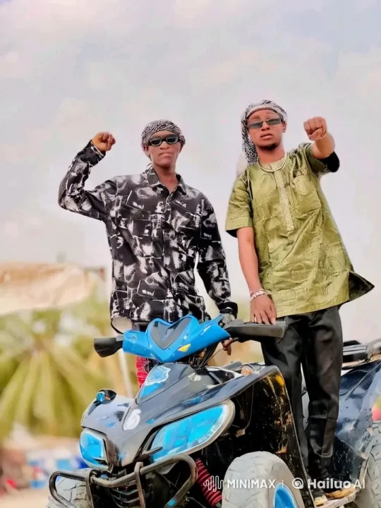 Young Men Spar on Quad Bike Amid Market Chaos – AI Generated Video | Hailuo AI