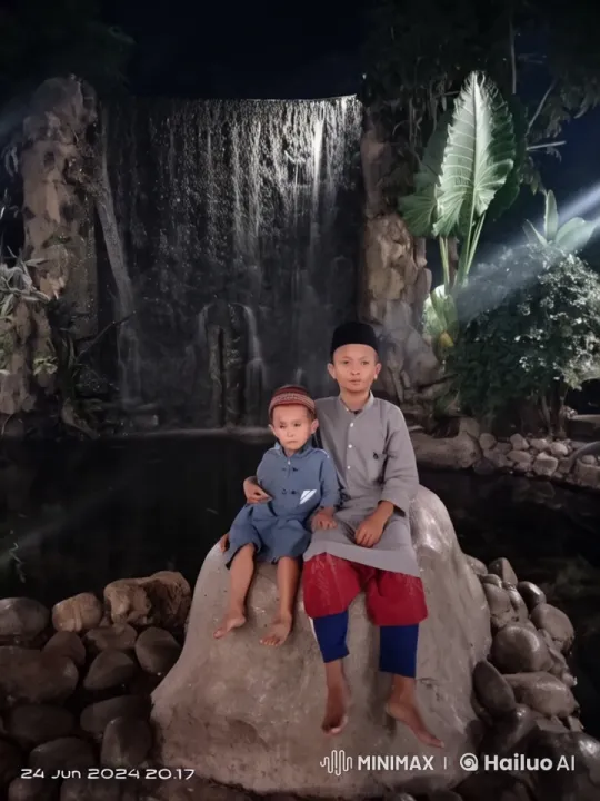 Boys Practice Graceful Kungfu by Nightfall Waterfall – AI Generated Video | Hailuo AI