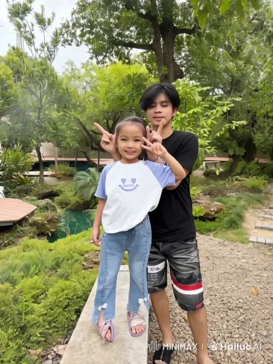 Lively Garden Kung Fu Display by Confident Girl and Man – AI Generated Video | Hailuo AI