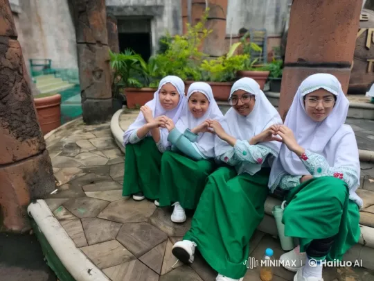 Girls in Green Skirts and White Headscarves Engage in Playful Fight – AI Generated Video | Hailuo AI