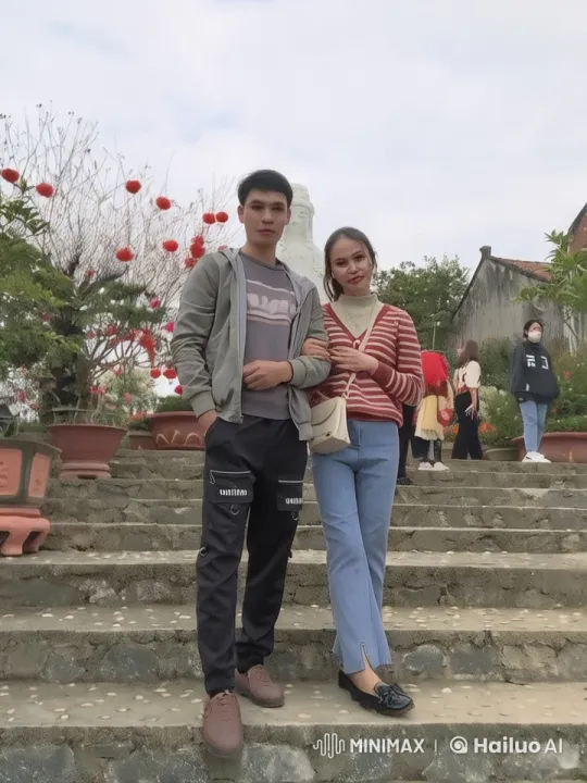 Couple Performing Synchronized Martial Arts in Festive Setting – AI Generated Video | Hailuo AI