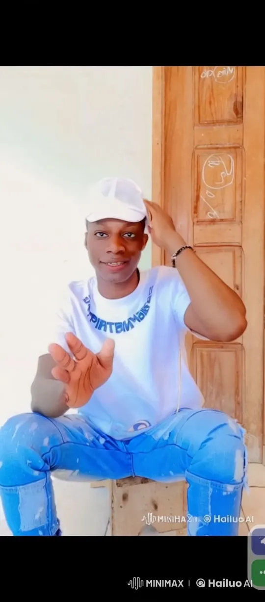 Young Person in Casual Pose by Chalked Door – AI Generated Video | Hailuo AI