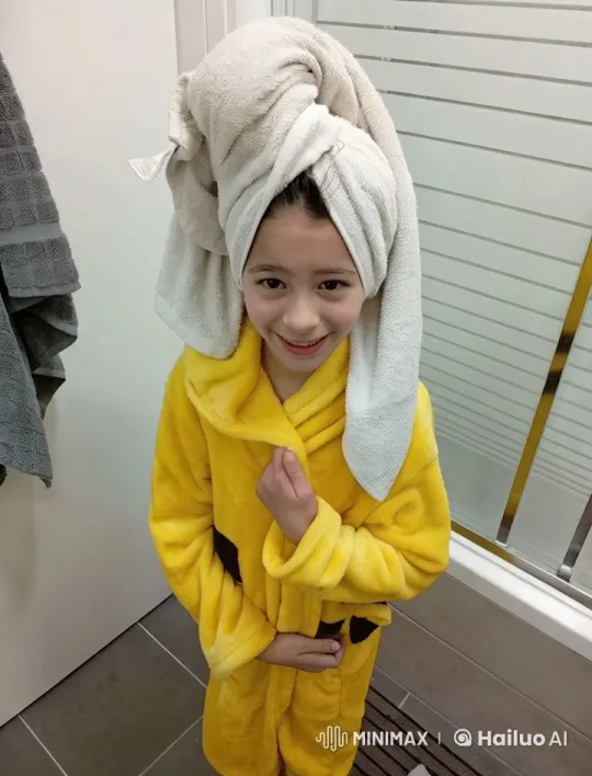 Cozy Post-Bath Scene with Child in Animated Bear-Inspired Robe – AI Generated Video | Hailuo AI