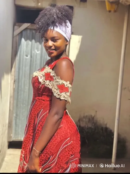 Enchanted Woman in Red Dress with Floating Petals and Rising Smoke – AI Generated Video | Hailuo AI