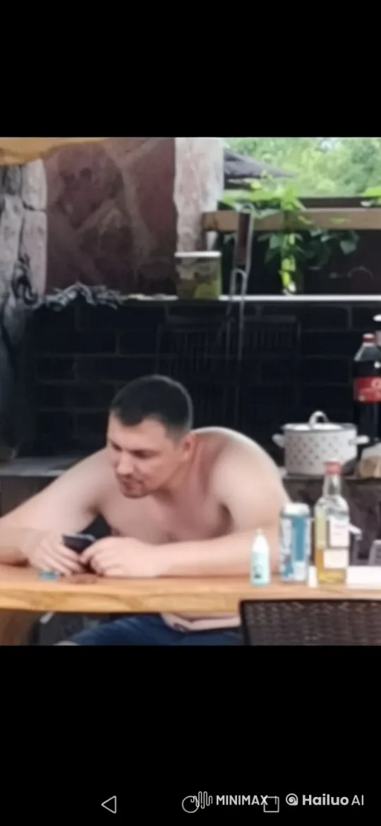 Man Reflects on Plans, Laughs Over Memories and Surprise Notification – AI Generated Video | Hailuo AI