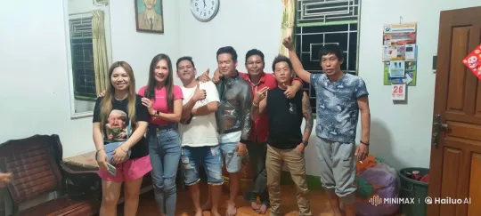 Cozy Group Photo with Animated Minion Surprise – AI Generated Video | Hailuo AI