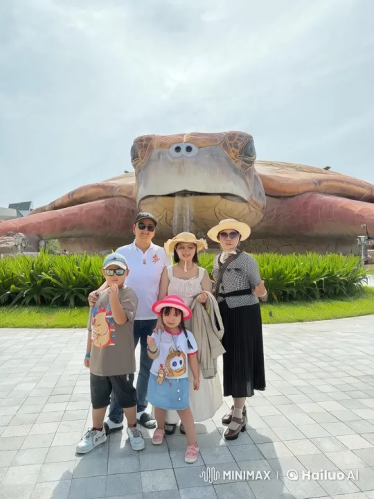 Family Practicing Kungfu in Park with Turtle Sculpture – AI Generated Video | Hailuo AI
