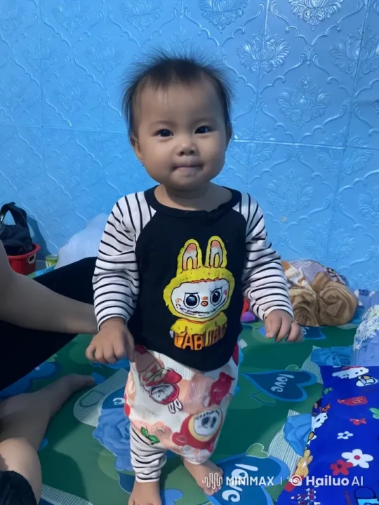 Young Child Performing Kung Fu in Cozy Room – AI Generated Video | Hailuo AI