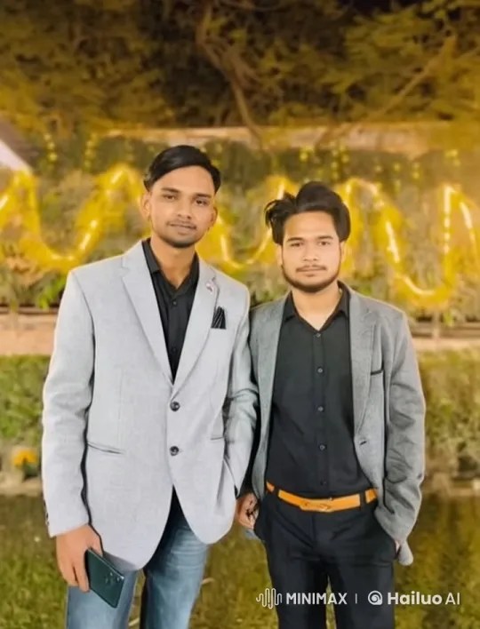 Festive Garden Scene with Two Men in Grey Blazers Sharing a Hug – AI Generated Video | Hailuo AI