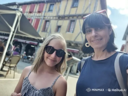 Mother and Daughter's Tender Moment in Historic Street – AI Generated Video | Hailuo AI