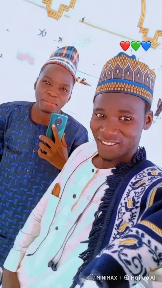 African Attired Trio Celebrates with Selfie in Decorated Space – AI Generated Video | Hailuo AI