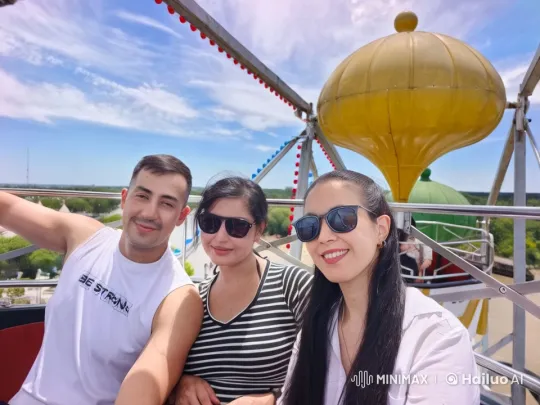 Friends Enjoy Ferris Wheel Ride with Kung Fu Showdown – AI Generated Video | Hailuo AI
