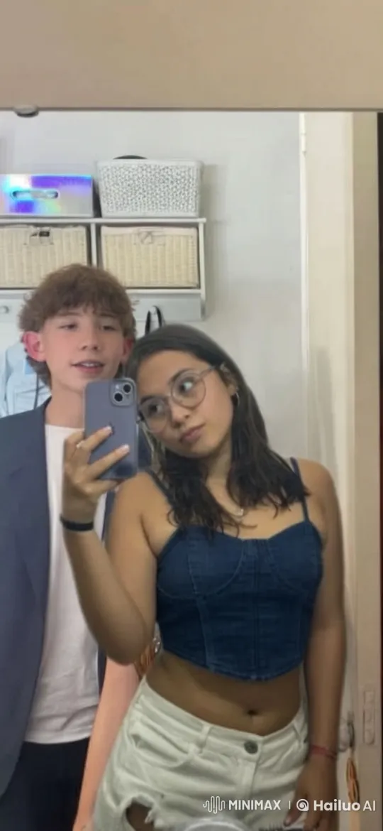 Boy and Girl Take Selfie and Share a Moment – AI Generated Video | Hailuo AI