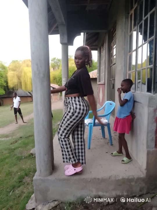 Woman Performs Kung Fu on Porch with Child Watching – AI Generated Video | Hailuo AI