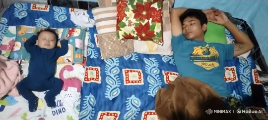 Baby's Playful Kungfu and Kicking on Patterned Bed – AI Generated Video | Hailuo AI